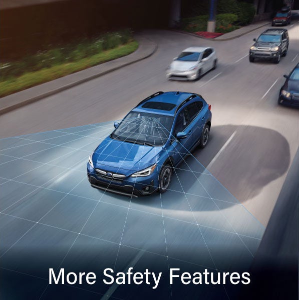 A Subaru Crosstrek in blue with the words “More Safety Features“. | Zappone Subaru Norwich in Norwich NY
